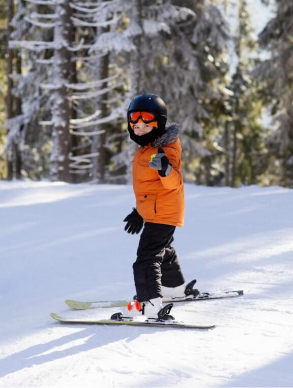 sportgardena-boy-equipment-is-skiing-snowy-slope